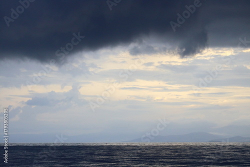 Heavy rain falls on a region in the Aegean Sea before a storm