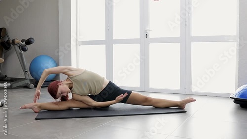 Kapotasana Pigeon Pose or its variation for deep hip and chest opening. A female athlete demonstrates exercises