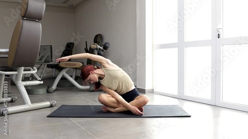 Strength and grace, a series of floor exercises to maintain physical fitness and well-being. A female athlete demonstrates exercises