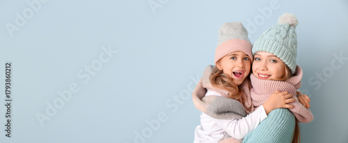 Woman and her little daught...