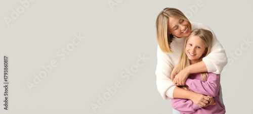 Beautiful woman hugging her...
