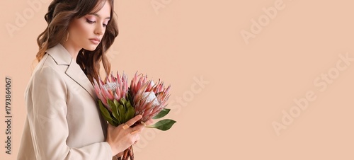 Beautiful young woman with ...