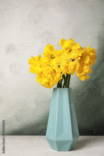 Vase with narcissus flowers...