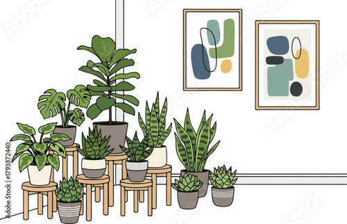 Indoor plant collection with various potted plants and wall art.