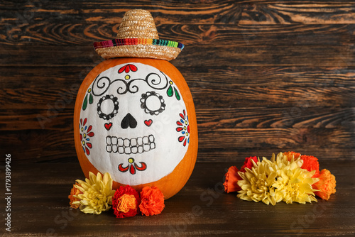 Pumpkin with painted skull,...