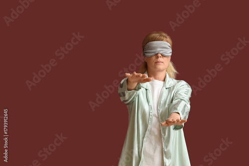 Female sleepwalker in pajam...