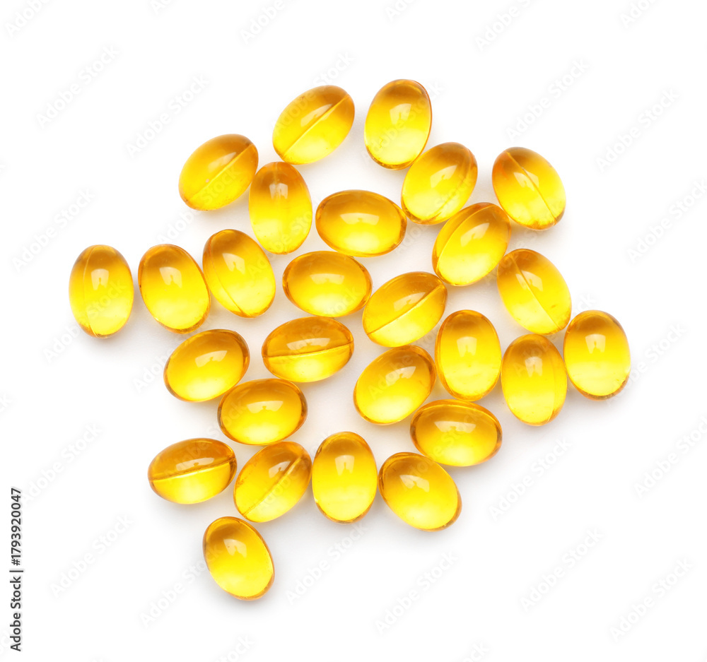 Fototapeta premium Vitamin E capsules on white background