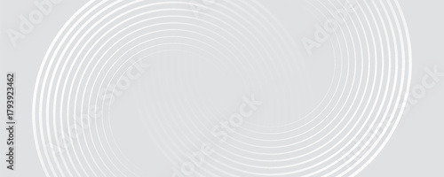 Abstract white geometric lines glowing on a gray background. Modern glossy white circle line pattern. Suitable for covers, posters, web, banners.