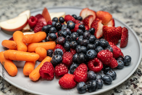 Grazing plate with fruits and vegetables, healthy snack for kids after school