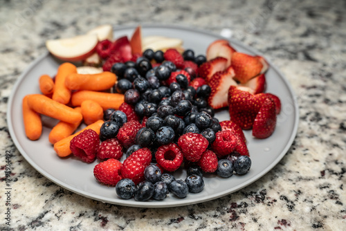 Grazing plate with fruits and vegetables, healthy snack for kids after school