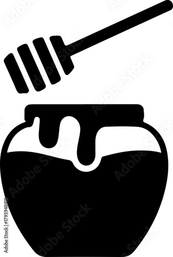 Black silhouette of a honey pot with a dipper dripping honey