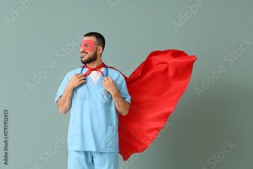Male doctor dressed as supe...