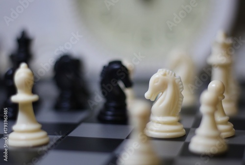chess pieces on the chess board artistic background game playing competition	
