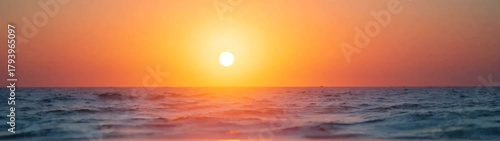 View of a sunset over the ocean with waves