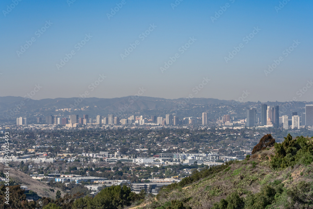 Obraz premium In the distance are Westwood (Los Angeles) and the Santa Monica Mountains. Kenneth Hahn State Recreation Area, Baldwin Hills Mountains of Los Angeles California
