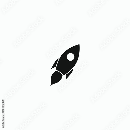 Simple black silhouette of a rocket taking off. Minimalist flat icon or logo design element for web and print. Minimalist black rocket vector icon. Simple flying spaceship silhouette logo