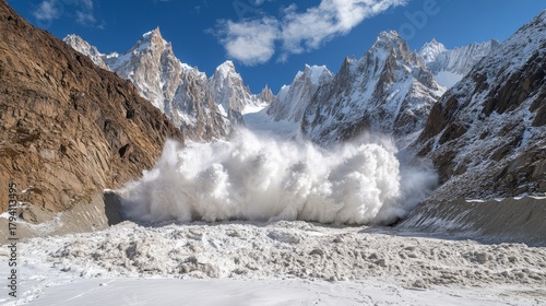 Huge avalanche falling from snowy mountain peaks in the karakoram range