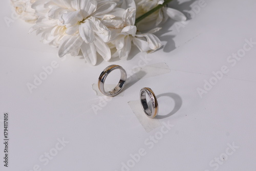 wedding rings and bouquet
