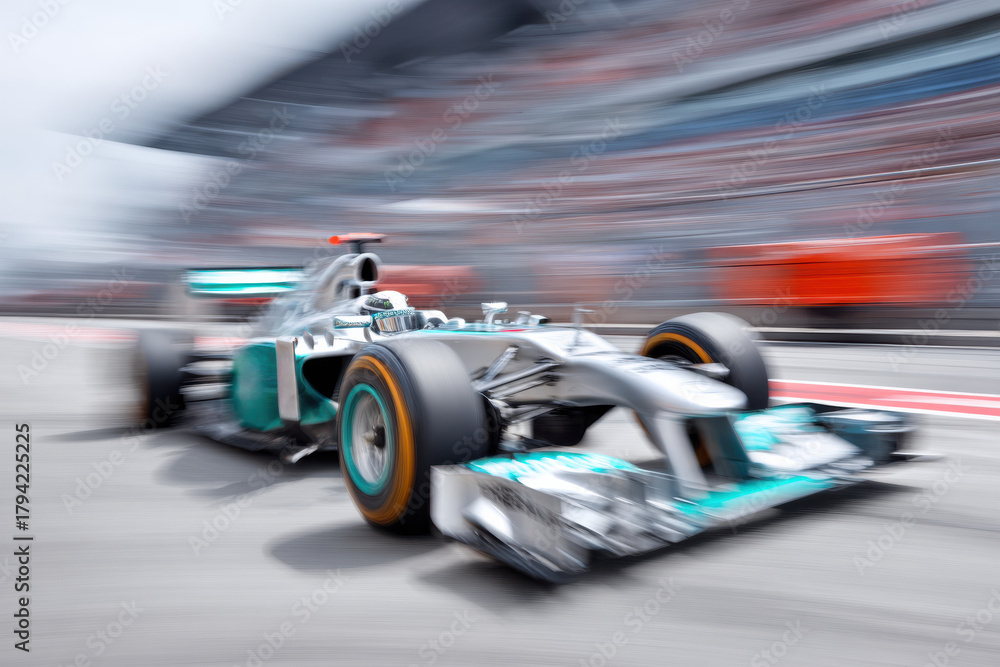 Obraz premium Motion blur of a car speeding around a circuit