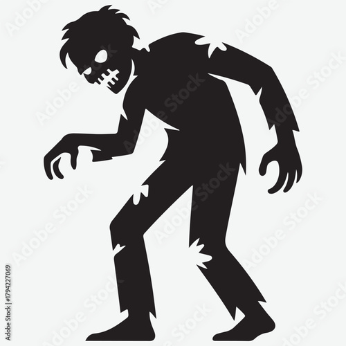 Silhouette of a menacing zombie with tattered clothes and glowing eyes
