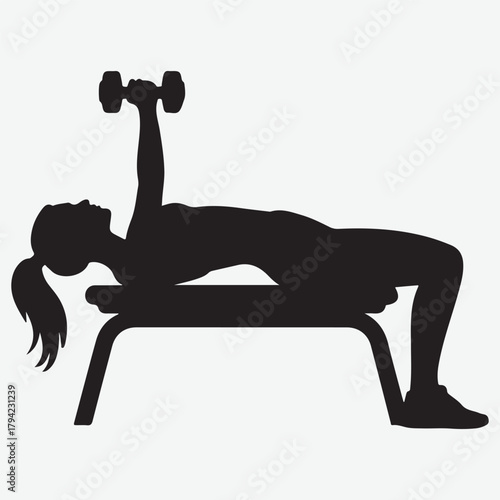 Silhouette of a woman performing a dumbbell chest press on a bench