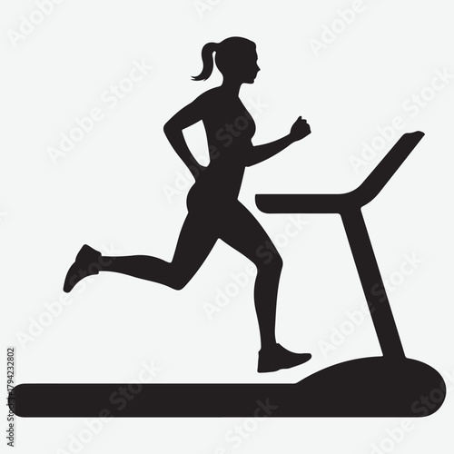 Silhouette of a Woman Running on a Treadmill