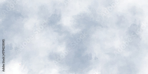 Fluffy white clouds drift across the bright blue sky on a summer day