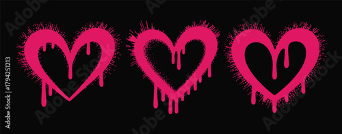 Three Pink Graffiti Style Hearts with Dripping Paint on Black Background spray paint