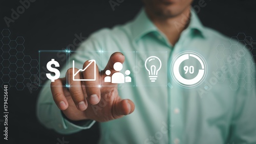 Business professional interacts with digital interface displaying financial growth, team collaboration, innovation, and progress metrics for strategic planning.