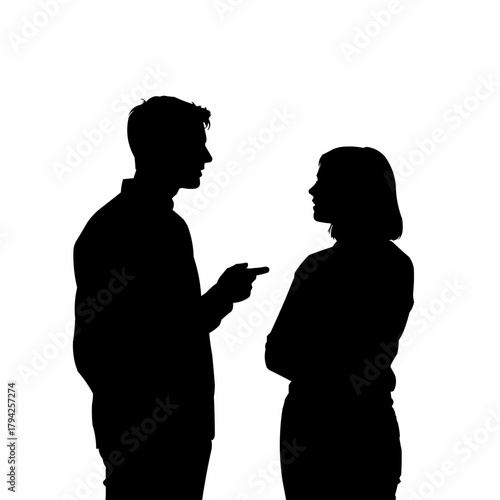 Silhouette of a man and woman in conversation.