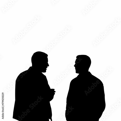 Two men in silhouette engaged in a conversation, discussing something important.