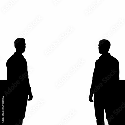 Two men standing in silhouette facing each other.