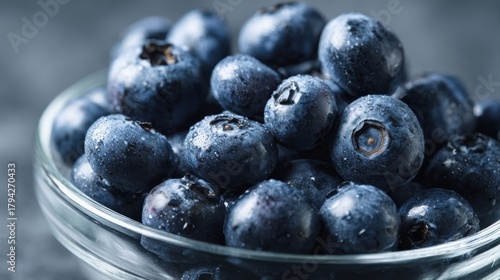 Wallpaper Mural Fresh and Juicy Blueberries in a Clear Glass Bowl with Water Droplets on a Dark Background Torontodigital.ca