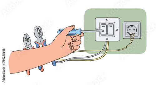 Hand holding screwdriver while installing light switch in garage  