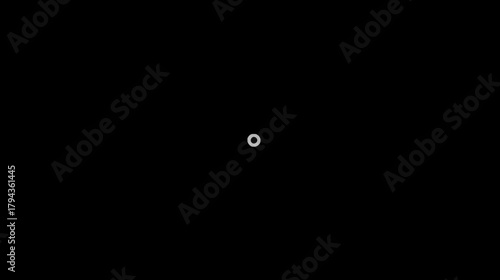 Digital loading spinner on black background for internet, waiting, or data processing