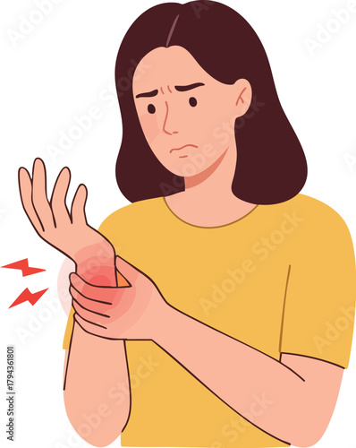 A young woman with dark hair wearing a yellow shirt holds her wrist in discomfort due to arthritis against a clean white background with a concerned expression.