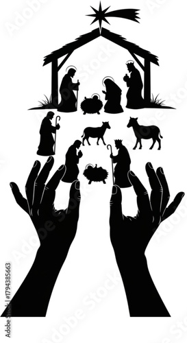 Black silhouette of hands holding the Christian nativity scene of Jesus Christ.