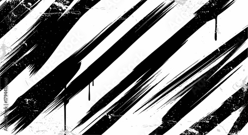 Abstract black paint brush strokes on a white grunge background with ink drips.