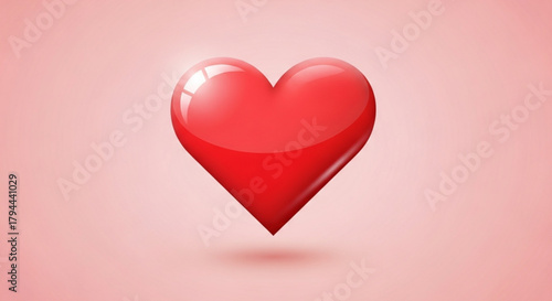 A glossy red heart floats against a soft pink background, symbolizing love, romance, and valentines day, perfect for expressing affection