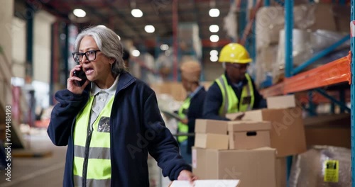 Phone call, angry and logistics with woman in warehouse for inventory management, late shipment or communication. Speaker, cancel prder and quality control with mature person for ecommerce supervisor