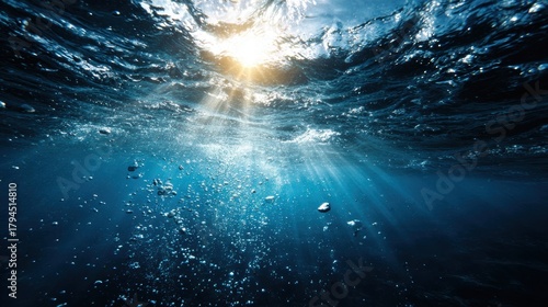 Fototapeta Naklejka Na Ścianę i Meble -  Underwater Sea - Deep Water Abyss With Blue Sun light ocean, blue, light, underwater, sea, deep, water