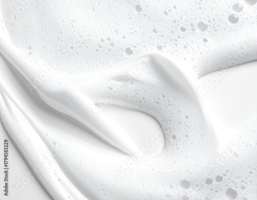 Creamy white foam with bubbles and soft, gentle textures