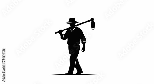 silhouette of a man with a hoe