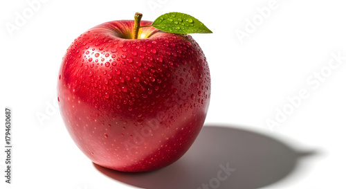 Perfect Red Apple with Water Drops and Green Leaf on White