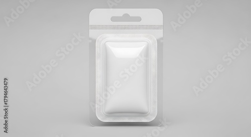 White blister pack with hanging tab on gray background packaging product