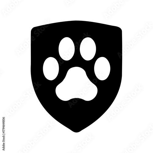 Black shield containing a white animal paw print isolated on white backdrop