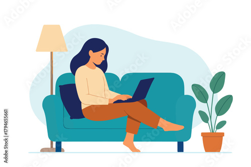 A woman sits on a blue sofa, typing on a laptop in a calm, homey living room. Soft light from a floor lamp and a potted plant create a comfortable, productive remote-work vibe.