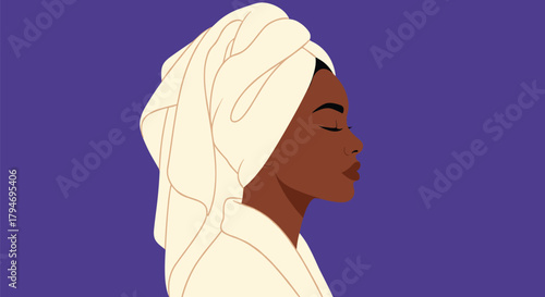 A woman in a towel and bathrobe taking a moment for self care.