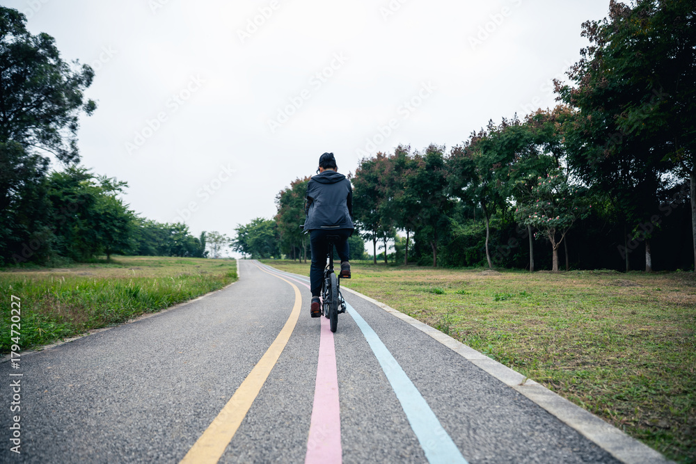 Fototapeta premium Riding bike at the bike lane