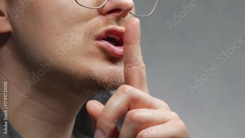 Don't shout and speak in a whisper.
Shh is a finger gesture.
Please don't speak loudly and maintain silence.
A finger to the mouth is a silence gesture.